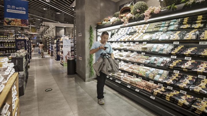 Inside Alibaba’s new kind of superstore: Robots, apps and overhead conveyor belts