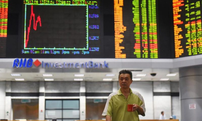 Asian Stocks Mixed After IMF Downgrades Economic Outlook
