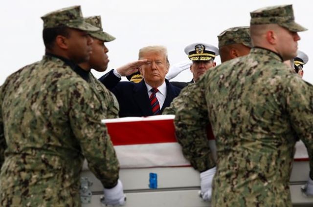 Trump salutes remains