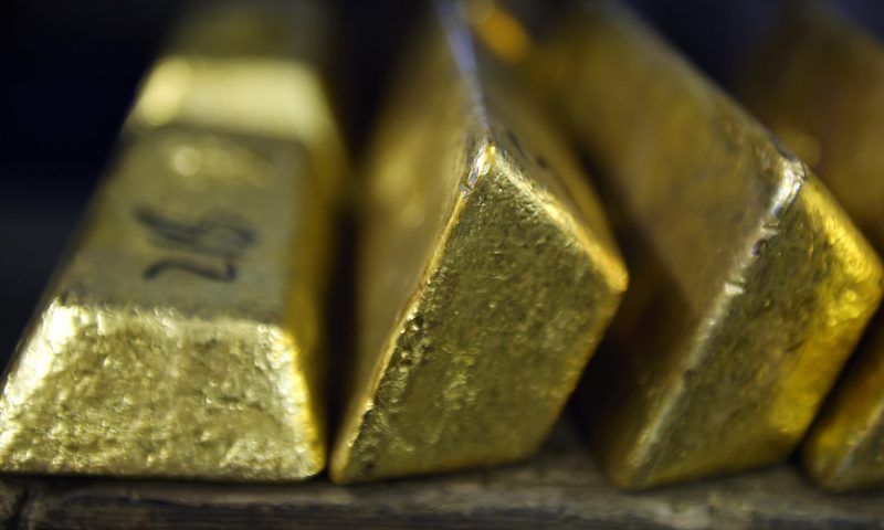 Gold jumps nearly 4% to settle near five-year high in reaction to Fed decision
