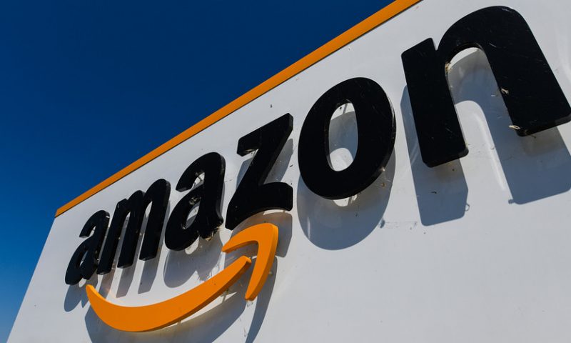 Amazon stock a rare gainer after price target boosted to Street-high $2,600
