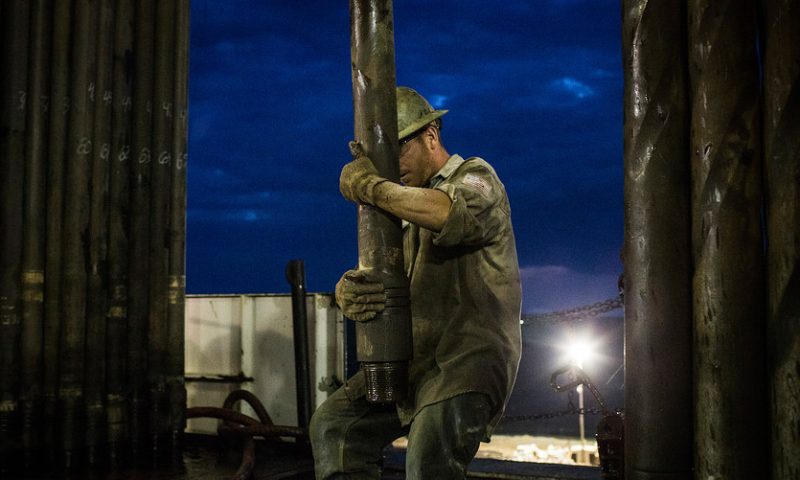 Oil futures end near a 2-week low as investors fret about crude demand