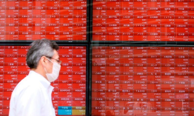 Asian markets surge after Fed increases its bond buys