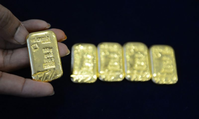 Gold prices drop nearly 3% as rise in coronavirus cases sparks dollar rally