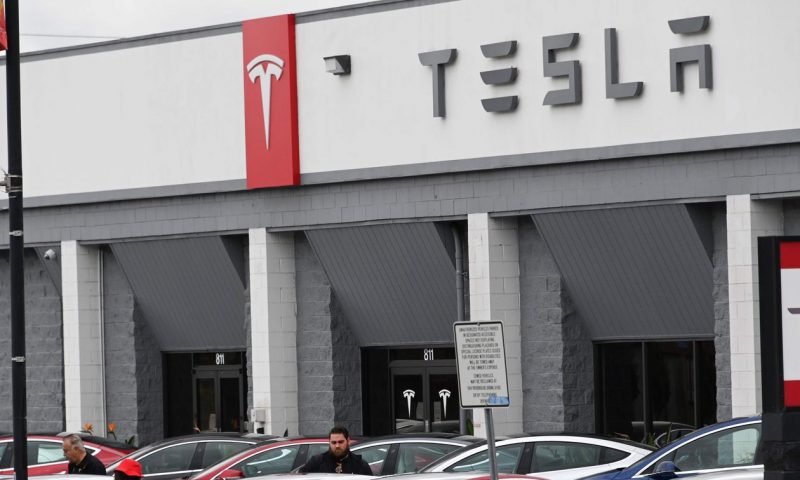 Tesla debt edges close to investment-grade rating at S&P
