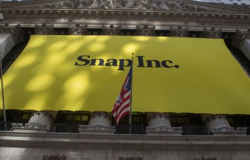 Dow ends with slight gain, as Nasdaq drops sharply in tech rout after Snap’s earnings warning